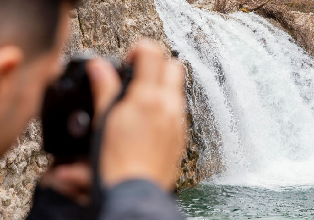 man-taking-photos-nature